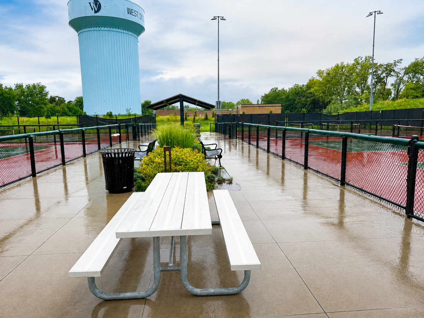 Outdoor pickleball courts at a green park